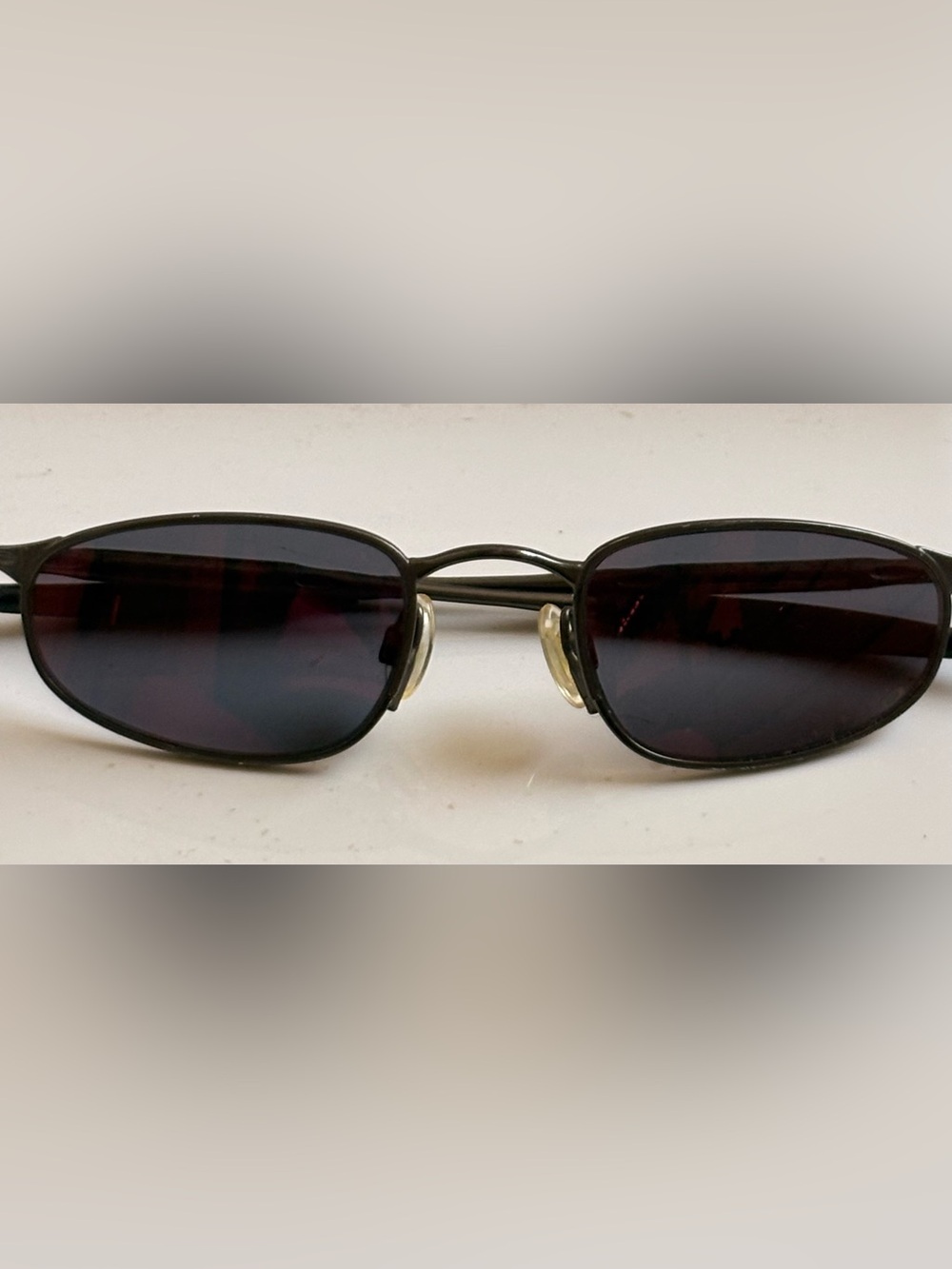 Oakley Sunglasses Gunmetal Grey Titanium Frame With Mirrored Rose Lenses